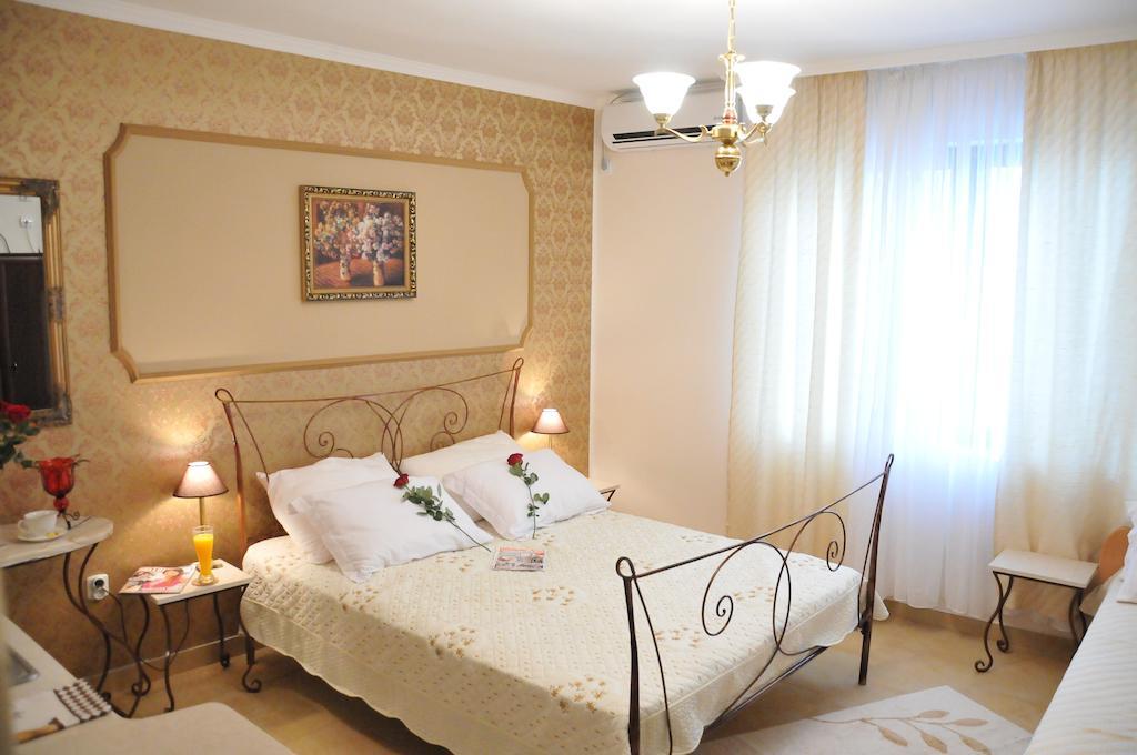 Royal Apartments Ni Værelse billede
