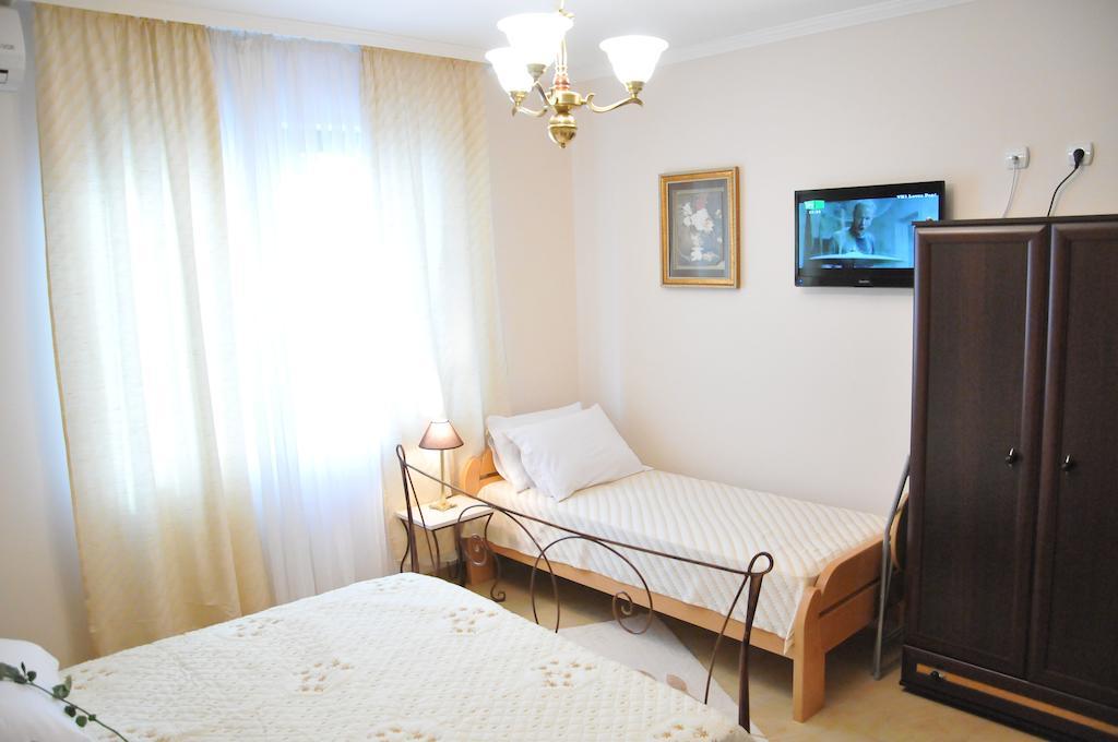 Royal Apartments Ni Værelse billede